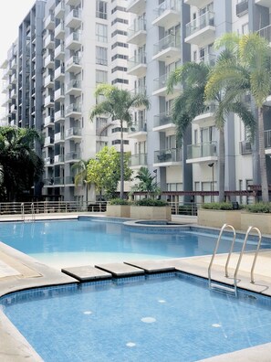 Outdoor pool - Luxury Condotel Across NAIA Manila Airport Terminal 3 (Pasay)
