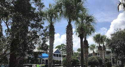 Minutes from sandy beaches. In gated community with pools, hot tub, fitness room
