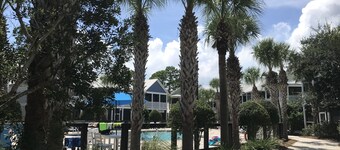 Minutes from sandy beaches. In gated community with pools, hot tub, fitness room