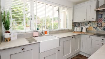 Fridge, dishwasher, electric kettle, cookware/dishes/utensils