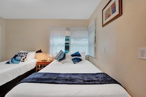Iron/ironing board, travel cot, bed sheets