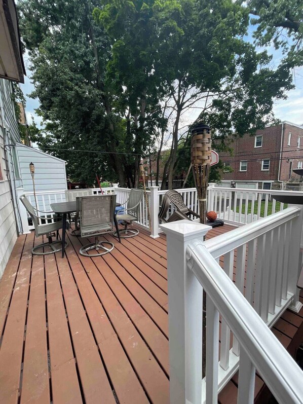 Enjoy outdoor dining on the deck with a view of the surrounding neighborhood, where you can relax and take in the sights.