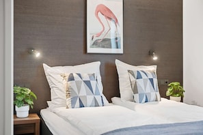 Habitación económica, 1 cama Queen size, para no fumadores | Cortinas blackout y ropa de cama