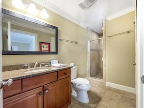A bathroom with a vanity, toilet, and shower area. - 90 Shell Ring Road at The Sea Pines Resort (Hilton Head Island)