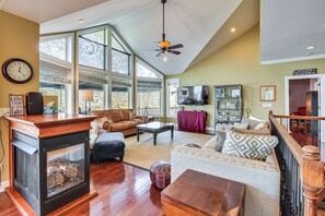 TV, fireplace, books, video library