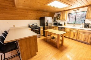 Fridge, microwave, oven, stovetop - Quaint A Frame in the heart of Duck Creek! Sleeps 8! 1 King, 3 Queen Beds, Firepit! (Duck Creek Village)