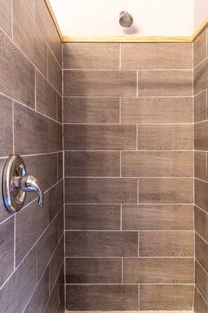 Combined shower/bathtub, hair dryer - Quaint A Frame in the heart of Duck Creek! Sleeps 8! 1 King, 3 Queen Beds, Firepit! (Duck Creek Village)