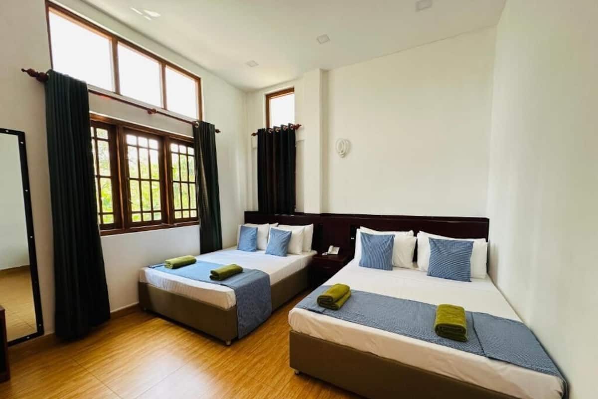 Family Deluxe Room | Premium bedding, memory-foam beds, minibar, individually decorated