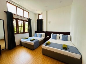 ห้องแฟมิลี่ดับเบิล | เครื่องนอนระดับพรีเมียม, เตียงเมมโมรีโฟม, มินิบาร์