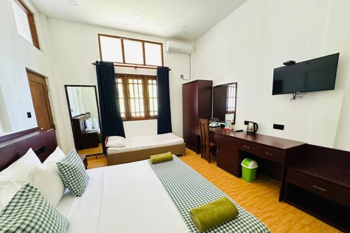Deluxe Triple Room | Premium bedding, memory-foam beds, minibar, individually decorated