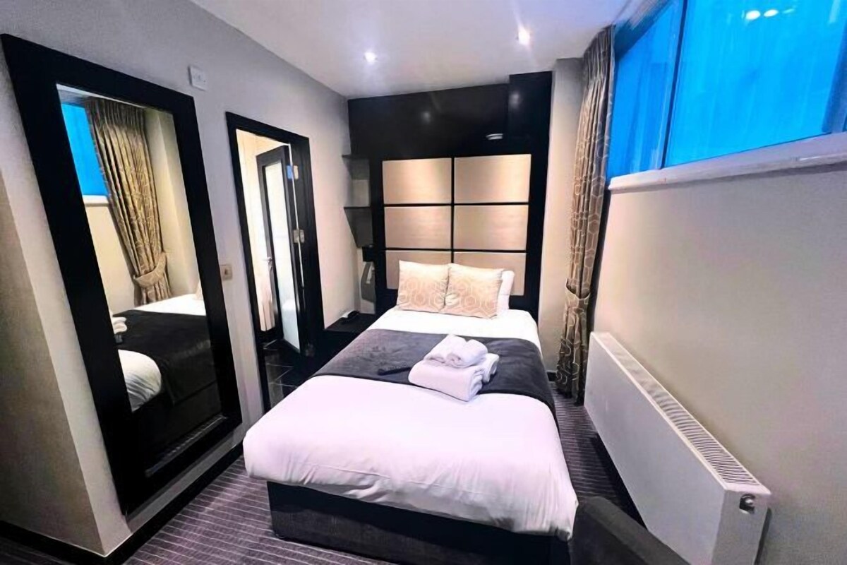 In-room safe, desk, blackout curtains, iron/ironing board (on request)