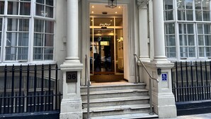 The entrance of the Great St. Helen Hotel with a classic facade, large windows, and a staircase leading to the entrance. - Great St Helen Hotel (London)