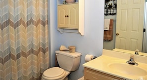 Combined shower/tub, hair dryer, towels, toilet paper