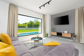 Smart TV, fireplace, video games, foosball