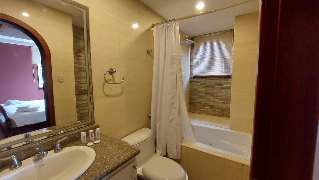 Hair dryer, towels, soap, shampoo
