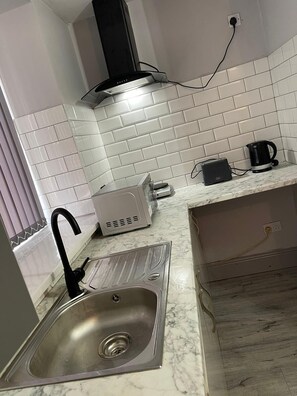 Studio, 1 grand lit | Cuisine privée