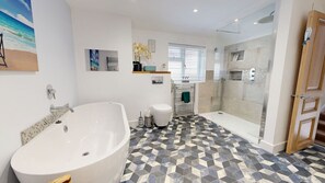 Shower, hair dryer, towels