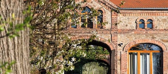 A designer studio beneath historic vaulted ceilings