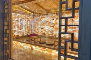 A room with a unique brick wall design, a wooden ceiling, and a glass partition. - Jinjiang International Hotel (Shangdu)