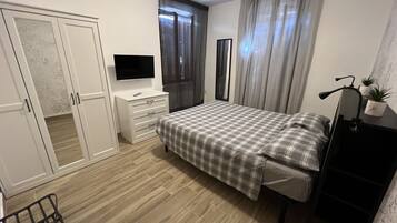 2 camere, culla da viaggio, Wi-Fi gratuito, lenzuola