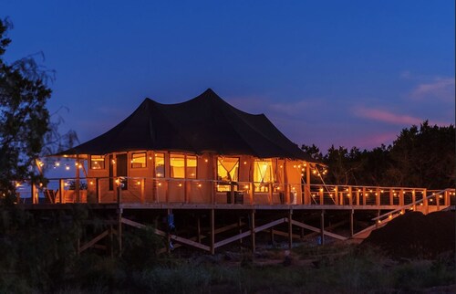 Private Outdoor Hot Tub with Stunning Mountain View Safari Tent Suite Glamping