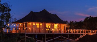 Private Outdoor Hot Tub with Stunning Mountain View Safari Tent Suite Glamping