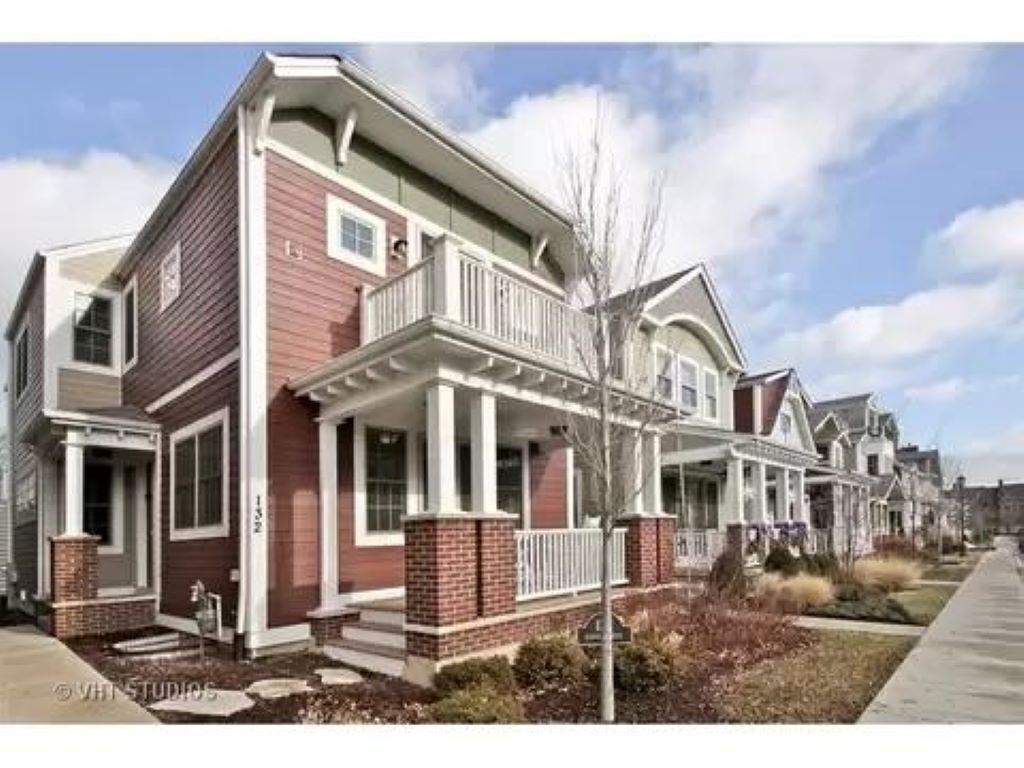 New elegant home with designer touches rooftop deck, balconies, & sunporch 