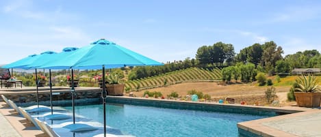 Outdoor pool, open 8:00 AM to 10:00 PM, free pool cabanas