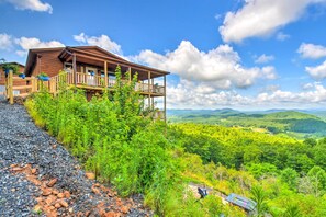 Enjoy panoramic views of the surrounding landscape from the spacious balcony.