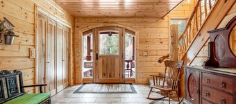 History-filled lakefront home with dock, fire pit, fireplace, & kayaks - dogs OK
