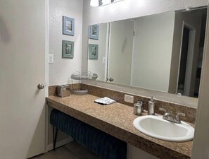 Combined shower/tub, hair dryer, towels, soap