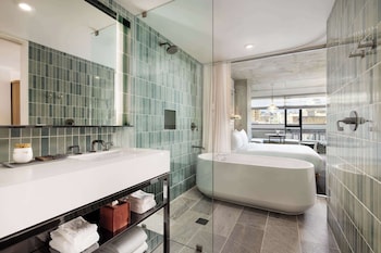Designer toiletries, hair dryer, bathrobes, towels at Timbri Hotel San Francisco, Curio Collection by Hilton
