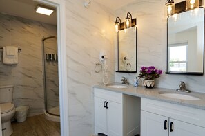 Combined shower/tub, hair dryer, towels, soap - Modern Spacious Beach Getaway + Private Deck -- 604 #5 (Seaside Heights)