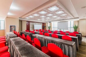 A conference room with rows of tables and chairs, a whiteboard, and a projector screen. - RONGDE (Hohhot Drum Tower, Jiangjun Yashu Metro Station) (Hohhot)