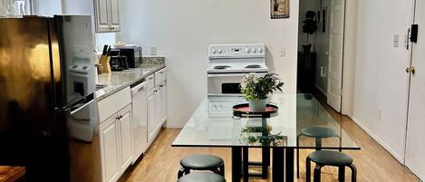 Coffee/tea maker, fridge, microwave, oven