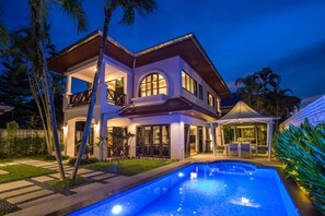 A two-story house with a swimming pool, large windows, and a balcony. - Havana Pool Villa with Gym and Billiard (Kamala)