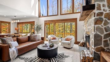 Smart TV, fireplace, table football, books