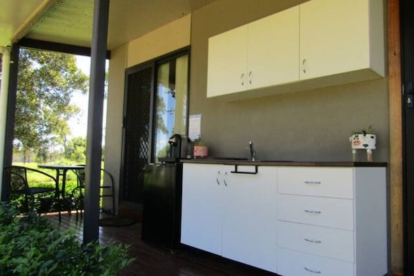 Fridge, stovetop, electric kettle, cookware/dishes/utensils