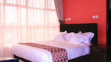 Blackout drapes, iron/ironing board, free WiFi, bed sheets