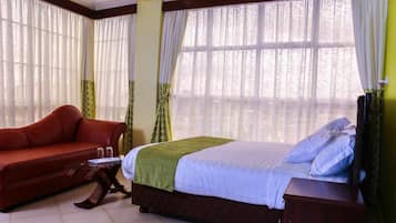 Executive Room | Blackout drapes, iron/ironing board, free WiFi, bed sheets