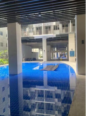 Outdoor pool, a heated pool - 1 BR Fully Furnished Condo Across MOA with Pool and Parking - S Res. Unit 0911 (Pasay)