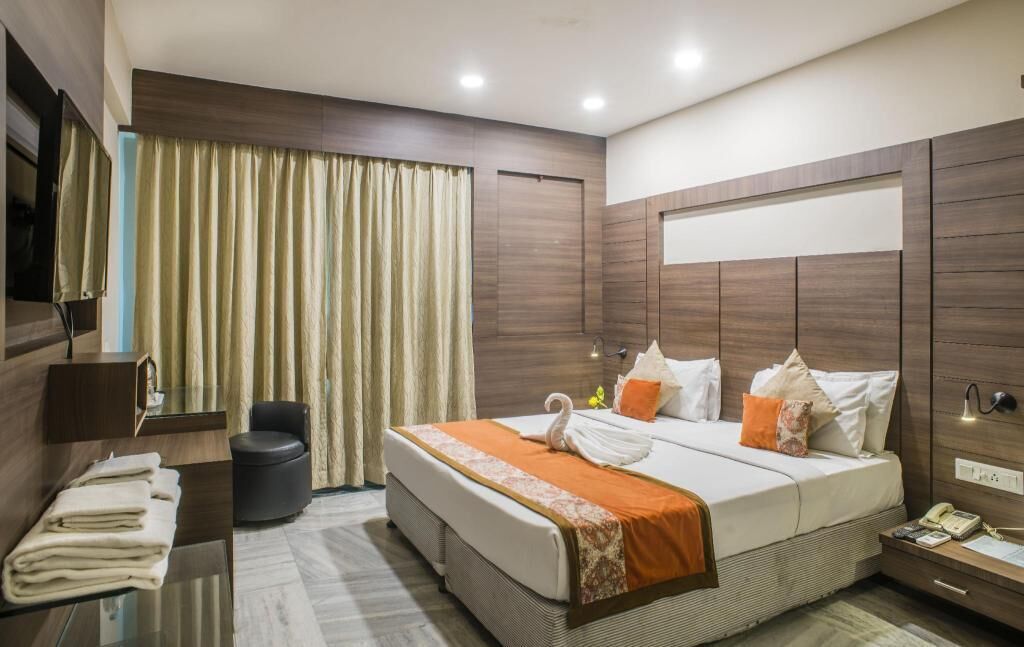 Blackout drapes, soundproofing, iron/ironing board, bed sheets
