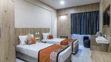 Blackout drapes, soundproofing, iron/ironing board, bed sheets