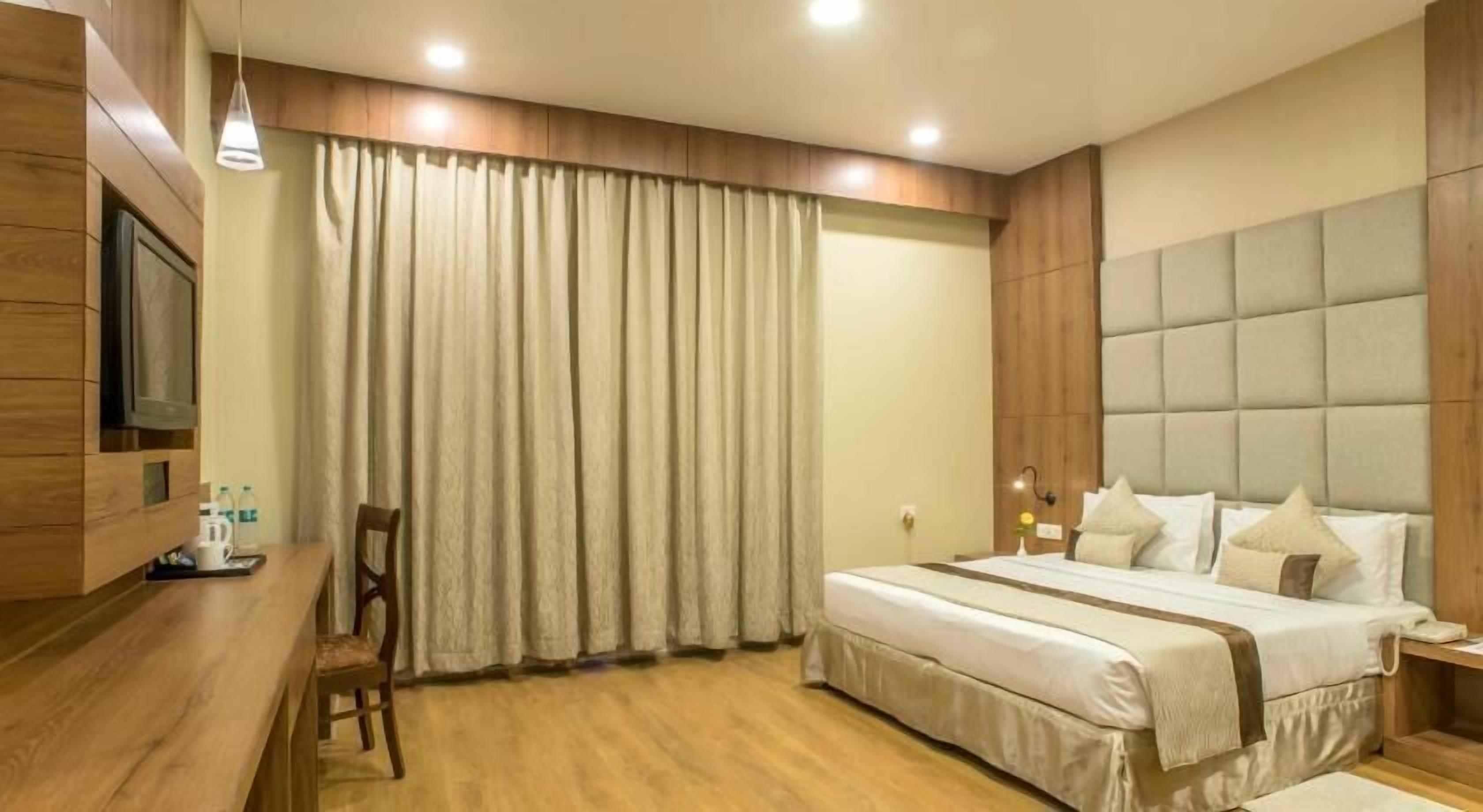 Blackout drapes, soundproofing, iron/ironing board, bed sheets