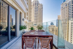 Outdoor dining - Breathtaking Sea View, Beachfront 2 BDR Apt in JBR (Jumeirah Beach Residences)