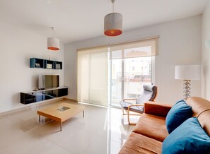 Deluxe Apartment (2 Bedrooms) | Living area | 44-inch TV with cable channels - Prime Location Apartment With Side Seaviews (Sliema)
