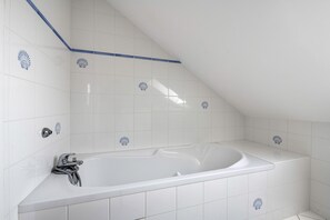 Bathtub, hair dryer