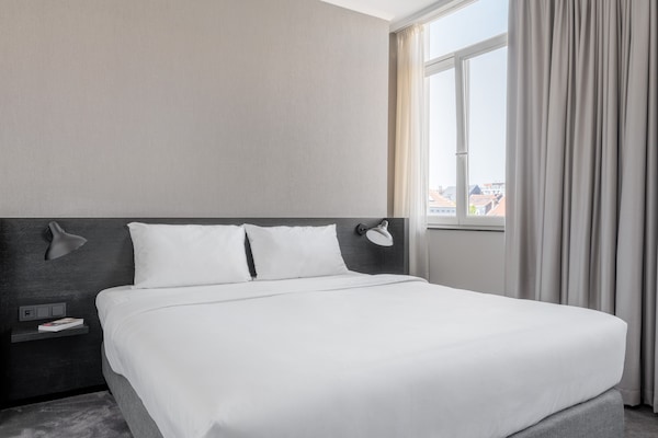 Literie de qualité supérieure, minibar, décoration personnalisée