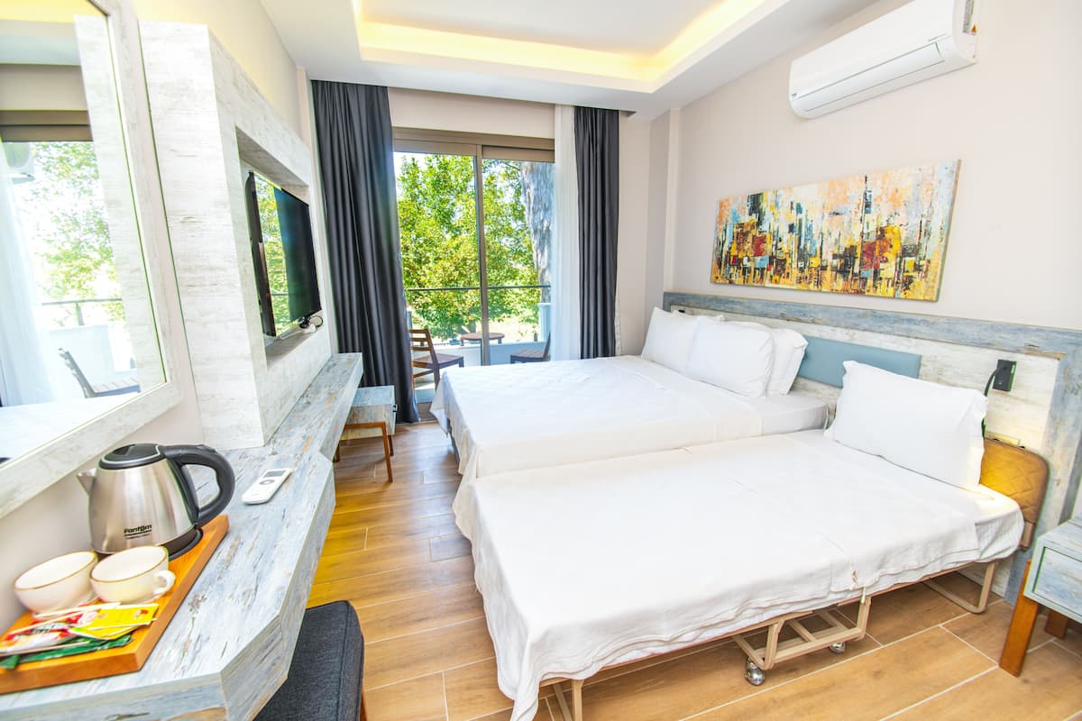 2 habitaciones, minibar y caja de seguridad en la habitación