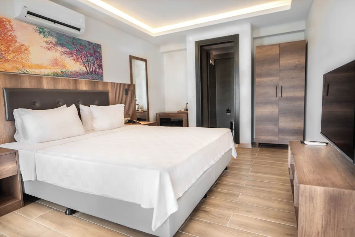 2 habitaciones, minibar y caja de seguridad en la habitación